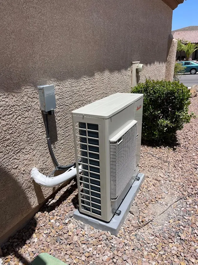 Residential air conditioning condenser unit in Brownsville